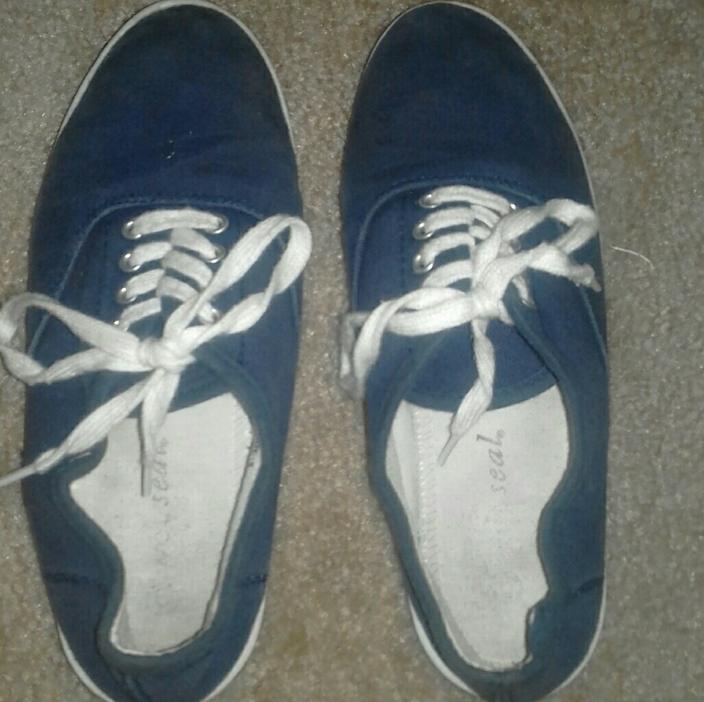 Wet and seal blue and white shoes